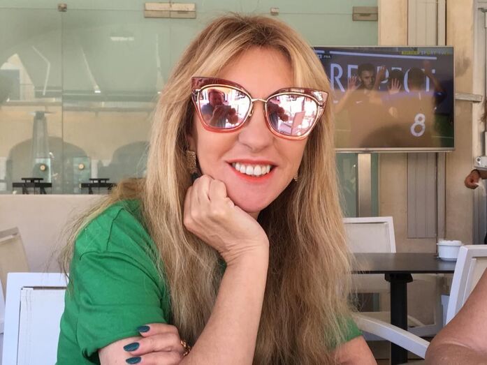 Judite de férias em resort de luxo